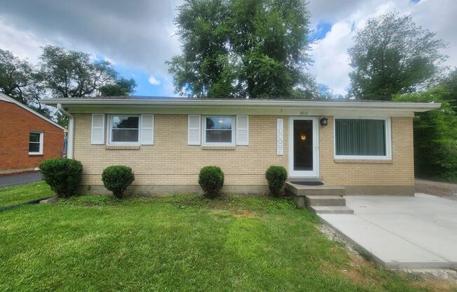 Beautiful and spacious 3 bedroom 1 bath home with large detached garage and updates!