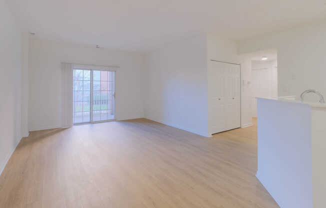 Living Room with Balcony and Hard Surface Flooring