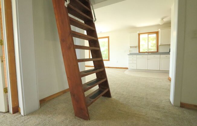 Spacious upper 3-bedroom unit with 2 full bathrooms in an attractive duplex.