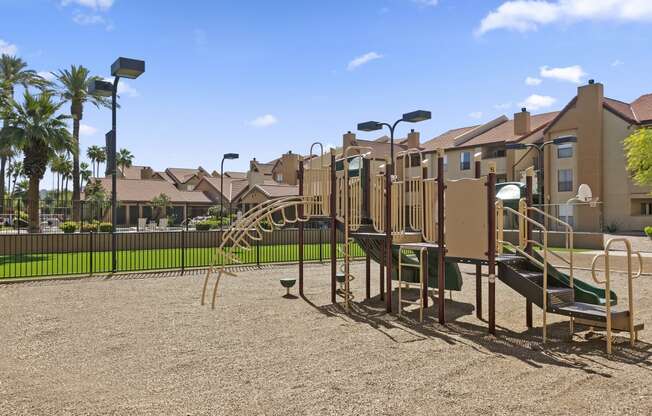 a playground at the whispering winds apartments in pearland, tx