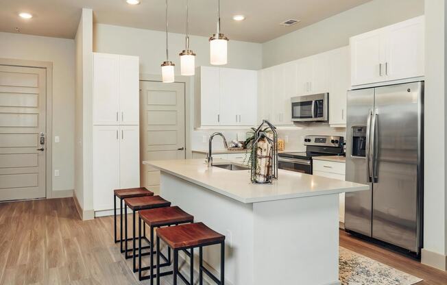 Spacious Kitchen with Island Including Breakfast Bar