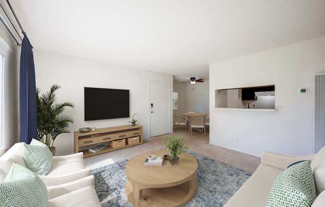A living room with a white couch and a wooden coffee table.