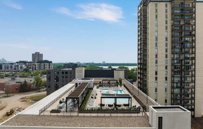a view of the pool from the top of the building