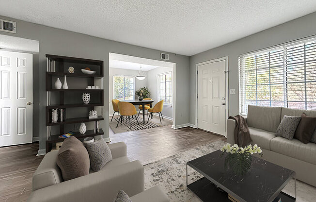 a living room with a couch and a table