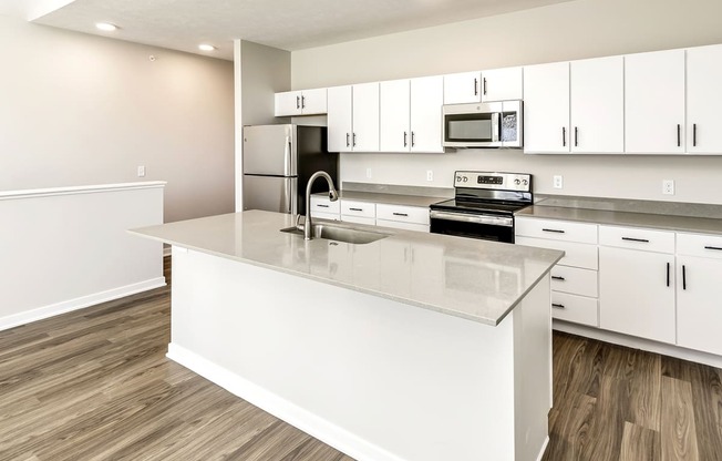 Studio, one two and three bedroom apartments and townhomes featuring open concept floor plans, dens, large windows, stainless steel appliances, quartz countertops, eat-in kitchens, pantries, LVT flooring and much more at The Trails at North Streams in Omaha, NE