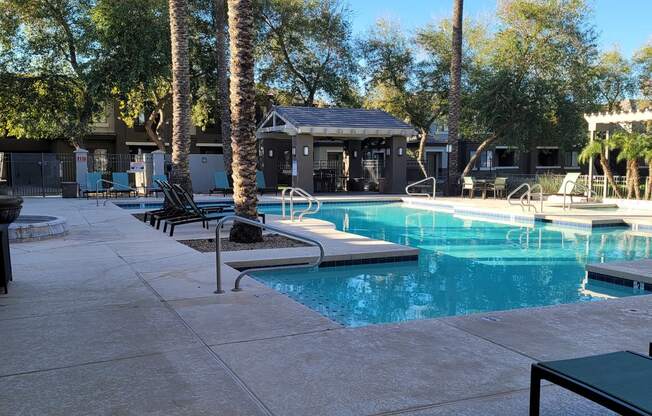 Pool and Lounge Area at Aldea at Estrella Falls Apartment Homes in Goodyear AZ