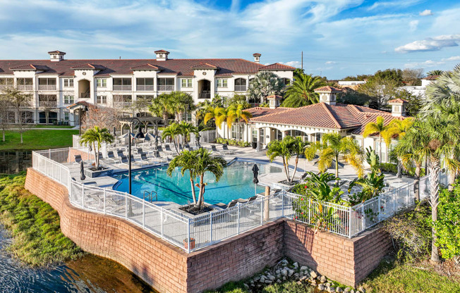 an aerial view of the pool at the resort at longboat key club