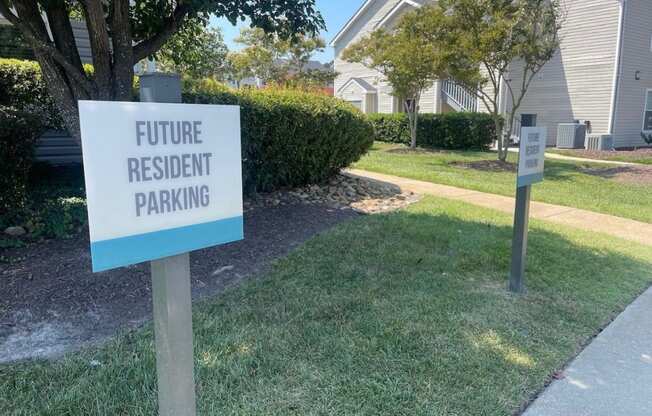 a future resident parking sign in front of a house