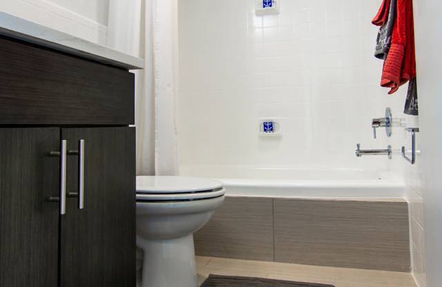 Bathroom with toilet at The Graham at Southern Towers, Virginia