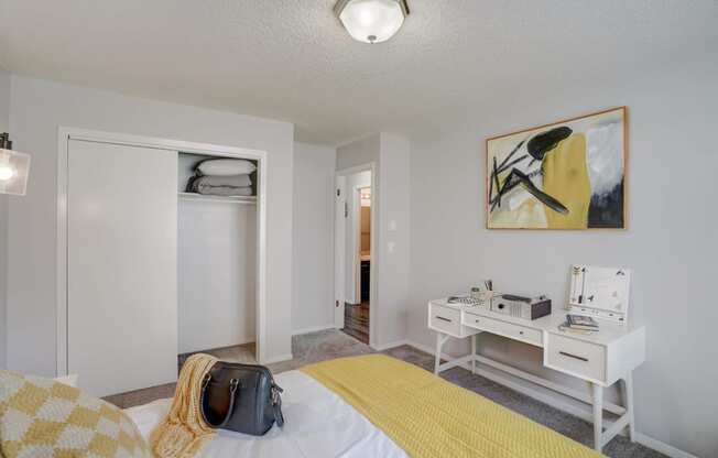 Bedroom with a white desk at Governor's Park, Fort Collins, 80525