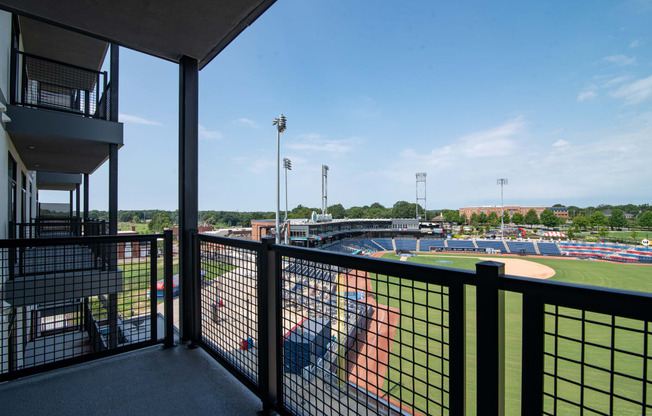 a view of a baseball field from a balcony at a baseball stadium