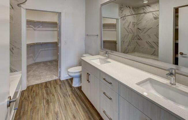 master bathroom with his and her sink at Brixton South Shore, Texas