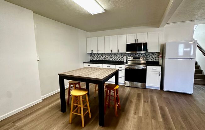 Available NOW - Highly Desired 2 BED 2 BATH with Den in lush Manoa Valley!