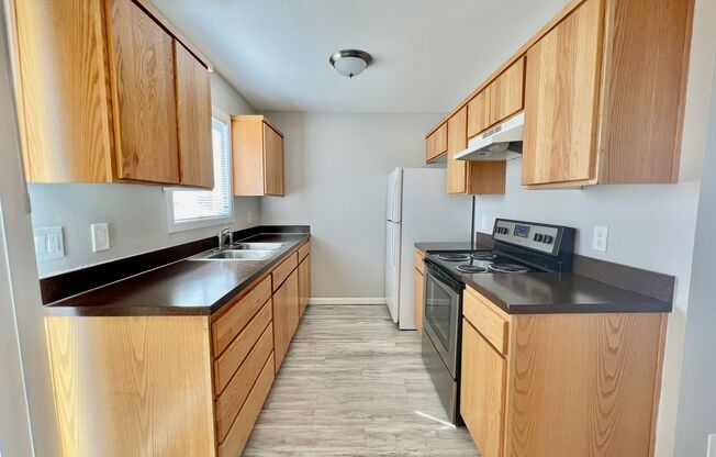 Spacious 2 Bedroom, 1.5 Bath, Townhome Style in Fairview!