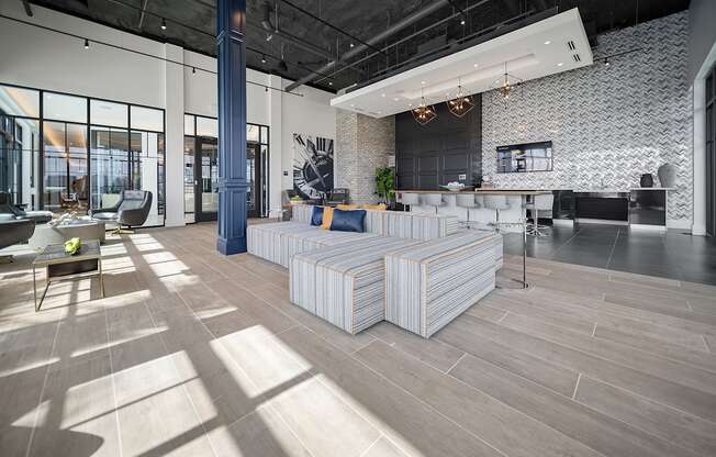 a large room with couches and chairs at Altis Grand Central, Tampa, FL