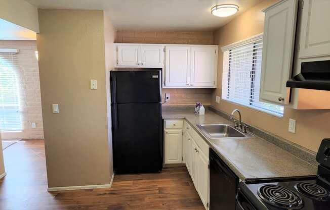 2x2 Upstairs Brown Upgrade Kitchen at Mission Palms Apartment Homes in Tucson AZ