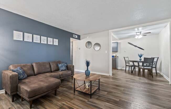 a living room with a couch and a table