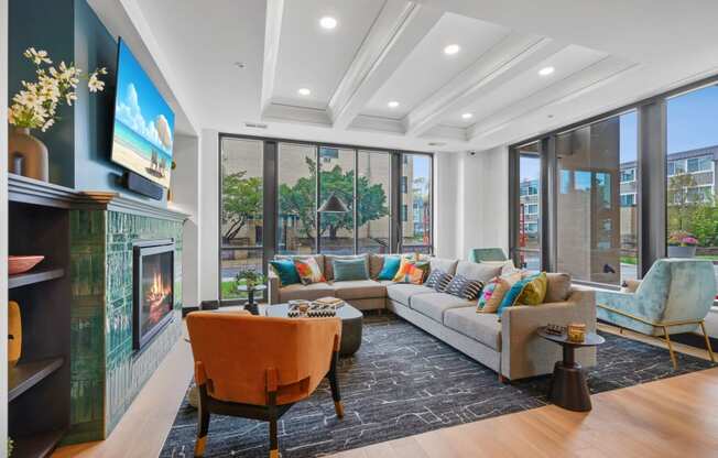 a living room with a couch and a fireplace