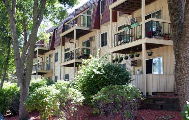 Exterior shot of apartments with patios and decks