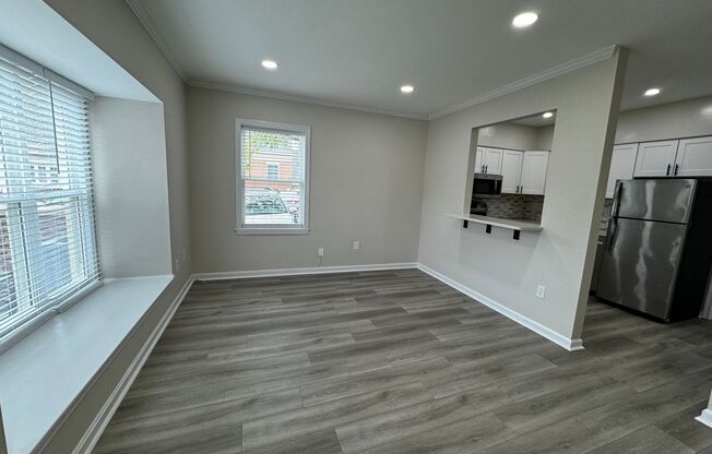 Bright and sunny corner 1br 1ba condo w patio in Clarendon. FULLY RENOVATED!