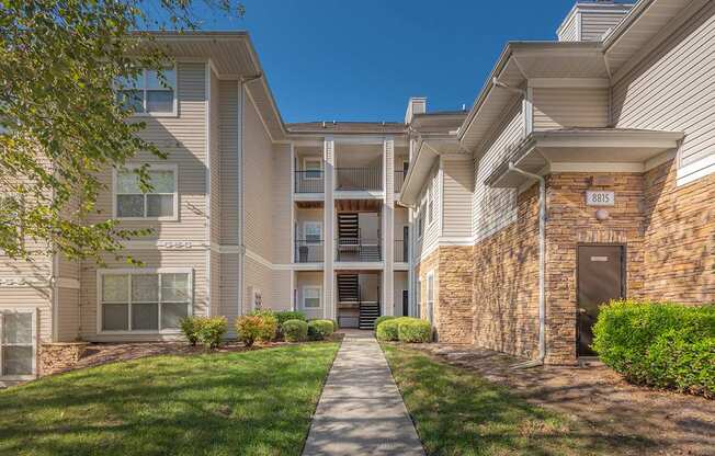 A residential building with a clear blue sky above.