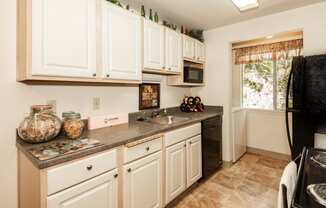 Kings Court Beaverton OR model kitchen and laundry