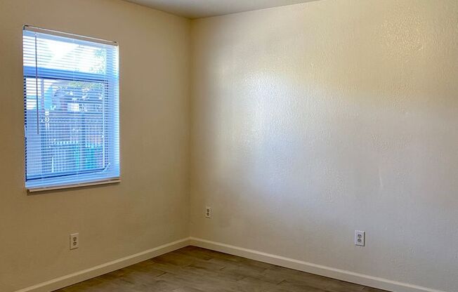 3 bedroom unit with private laundry. 2 OFF STREET PARKING SPOTS!
