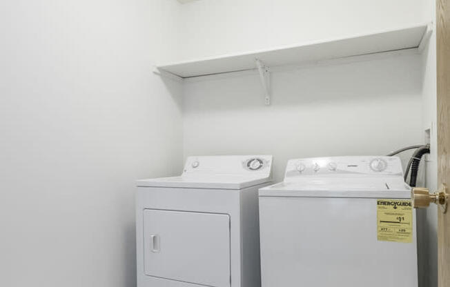 Full size washer and dryer and laundry room included at Northridge Heights Apartments