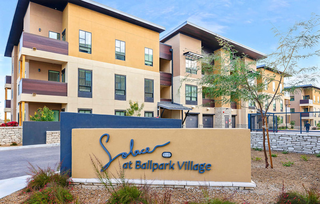A building with a sign that says "Solar at Ballpark Village".