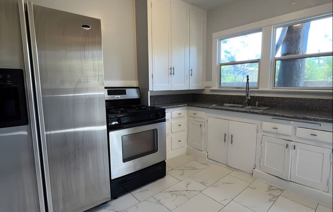BeautiRemodeled Studio Type Apartment - Comes with Parking, Water/Trash Included, No Application fee, and LA City Section 8 Accepted!
