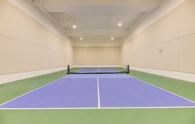 a person on a court with a racket