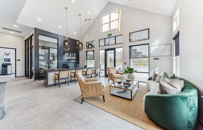 a living room with a couch and chairs and a table at Plat 4 at Research Triangle, Durham