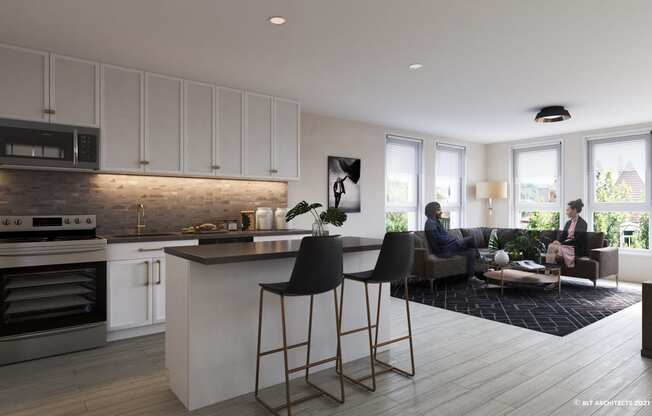 a kitchen and living room with a woman sitting on a couch