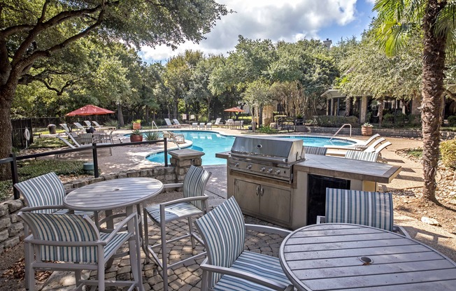 Dine poolside at Alister Sunset Valley’s outdoor dining area  with grilling station.