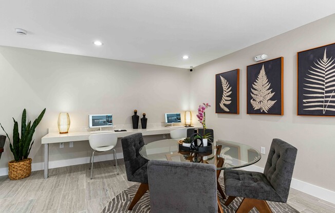 Elevate your lifestyle at Sonoma Apartments with our stylish common area featuring modern workstations and inviting décor. Perfect for both productivity and relaxation. Explore what your new home could be—schedule a tour today!