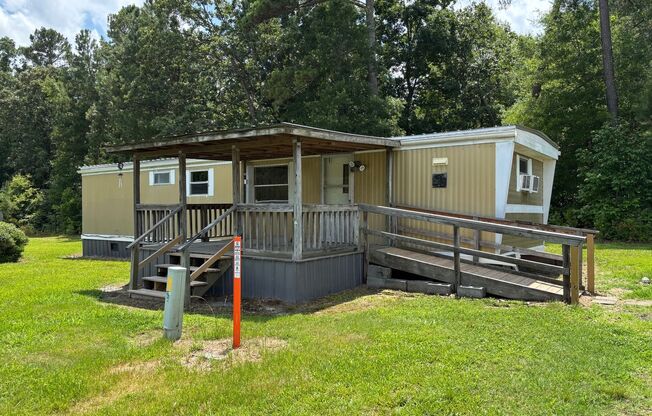 2 BDRM 1 BA SINGLEWIDE MOBILE HOME IN PARK, INSIDE PET OK EXTRA $25 PER MONTH
