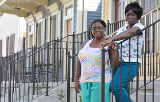 Front balconies with people outside_Lafitte,New Orleans, LA