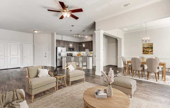 a living room with a dining room and a kitchen