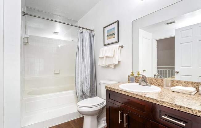 a bathroom with a sink toilet and shower at Waterford Park Apartment Homes, LLC, Lauderhill, FL