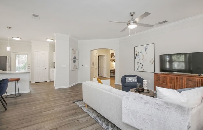 a living room with a couch and a tv at Sladestone Shadow Creek, Texas, 77584