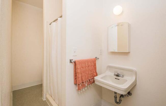 a bathroom with a sink and a shower at MILEPOST 5 Apartments, PORTLAND Oregon