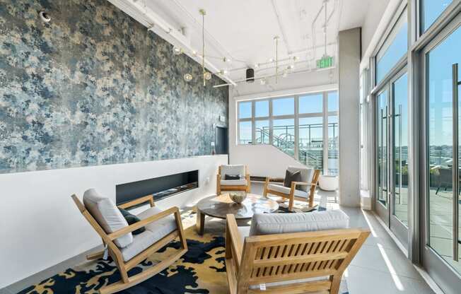 a view of a spiral staircase in a building with rows of wooden benches  at Link Apartments® H Street, Washington, Washington
