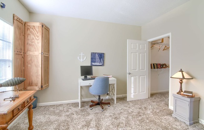 Enclave at Wolfchase Apartments in Cordova Tennessee photo of a home office with a desk and computer