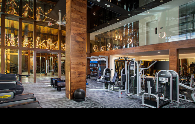 Expansive HIIT-inspired fitness center with cardio and weight stations