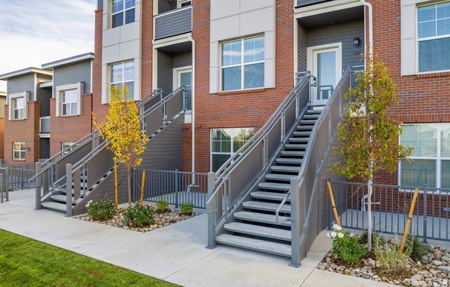 exterior of townhomes and staircases to front door at Palisade Park Townhomes, Broomfield, Colorado, 80023