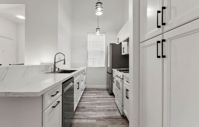 UPGRADED ONE BEDROOM OASIS IN GATED COMMUNITY