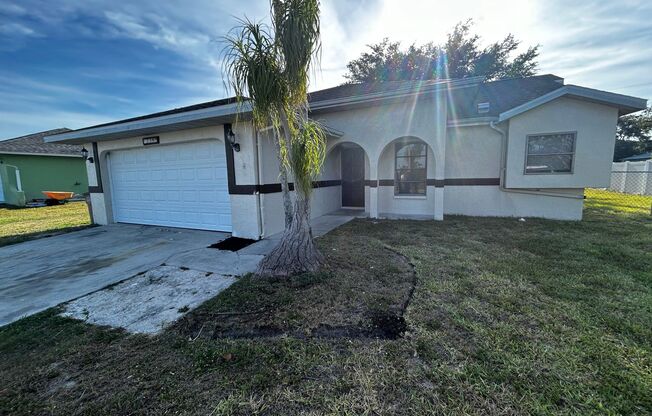 3307 SW 11th Pl - 3-Bedroom Single-Family Home with Screened lanai, new flooring and fence– Now Available in SW Cape Coral