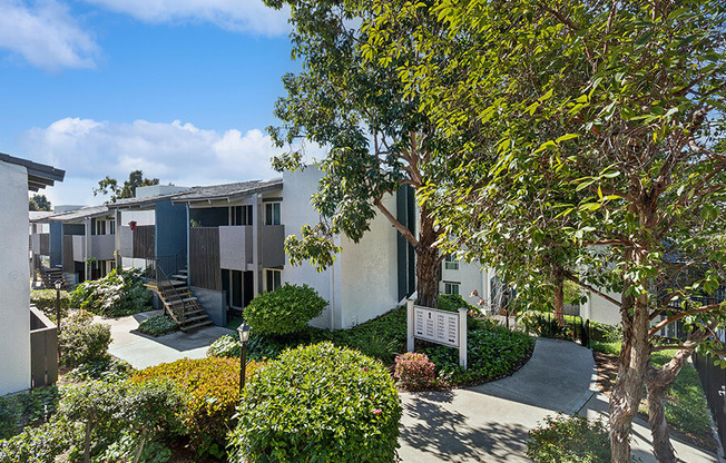 Exterior Community Building and Landscape at Colonnade at Fletcher Hills Apartments in El Cajon, CA.