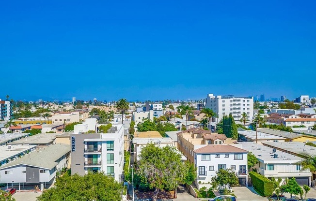 A residential area with houses and trees.