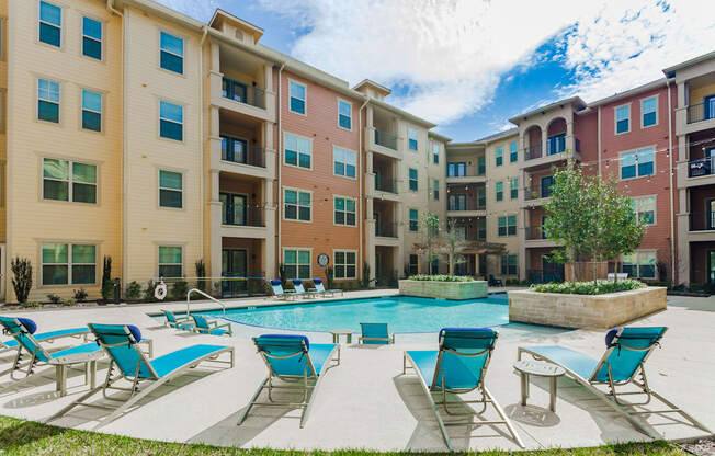 our apartments have a large pool and lounge chairs